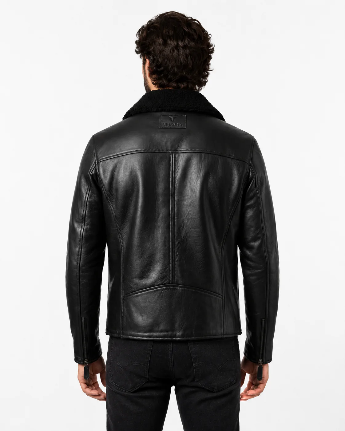 Back construction and VELDRIC branding on a leather jacket